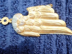Gold Wing Pelican of Piety